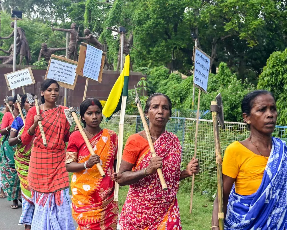 The protest resonated across Bengal. Here, tribal women march in Balurghat in South Dinajpur, West Bengal, on August 24. The protest resonated across Bengal. Here, tribal women march in Balurghat in South Dinajpur, West Bengal, on August 24.