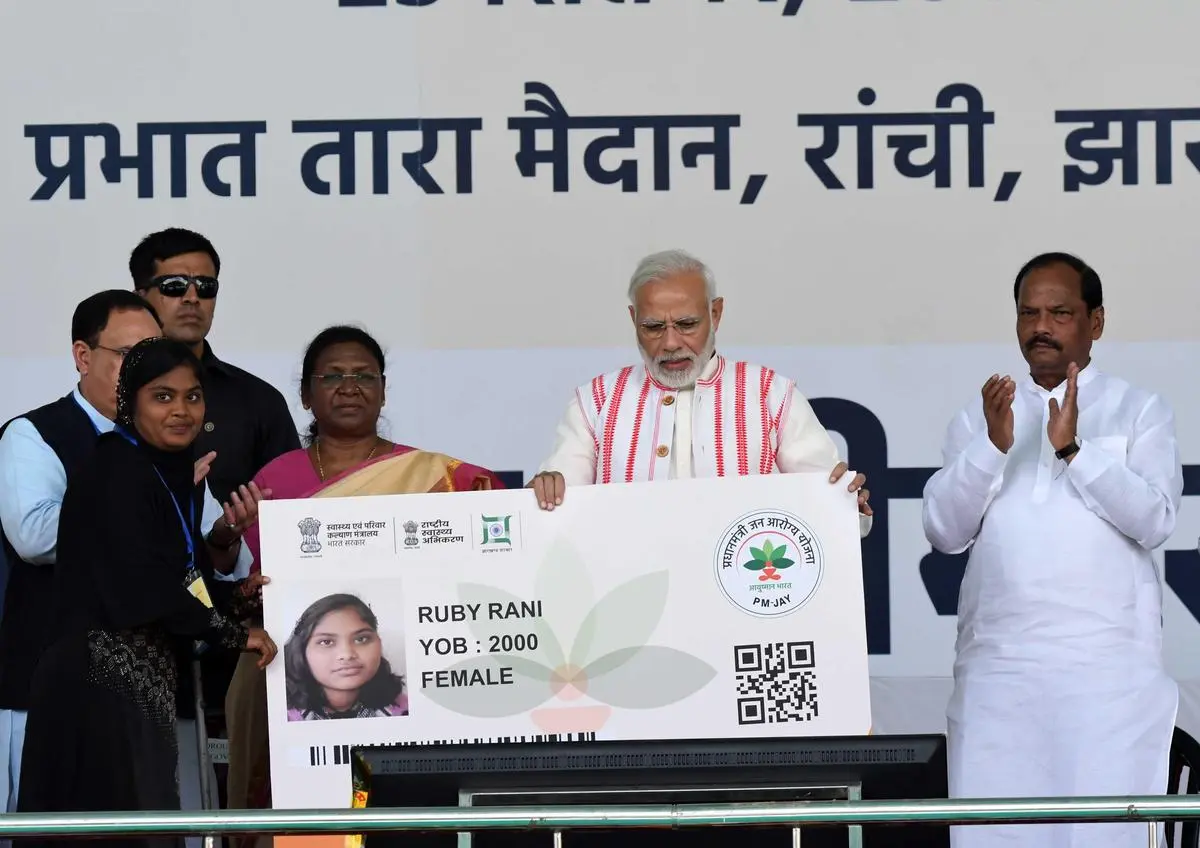Prime Minister Narendra Modi at the launch of the Pradhan Mantri Jan Arogya Yojana, in Ranchi on September 23, 2018, which was attended by the then Jharkhand Governor and current President Droupadi Murmu and others. Prime Minister Narendra Modi at the launch of the Pradhan Mantri Jan Arogya Yojana, in Ranchi on September 23, 2018, which was attended by the then Jharkhand Governor and current President Droupadi Murmu and others.