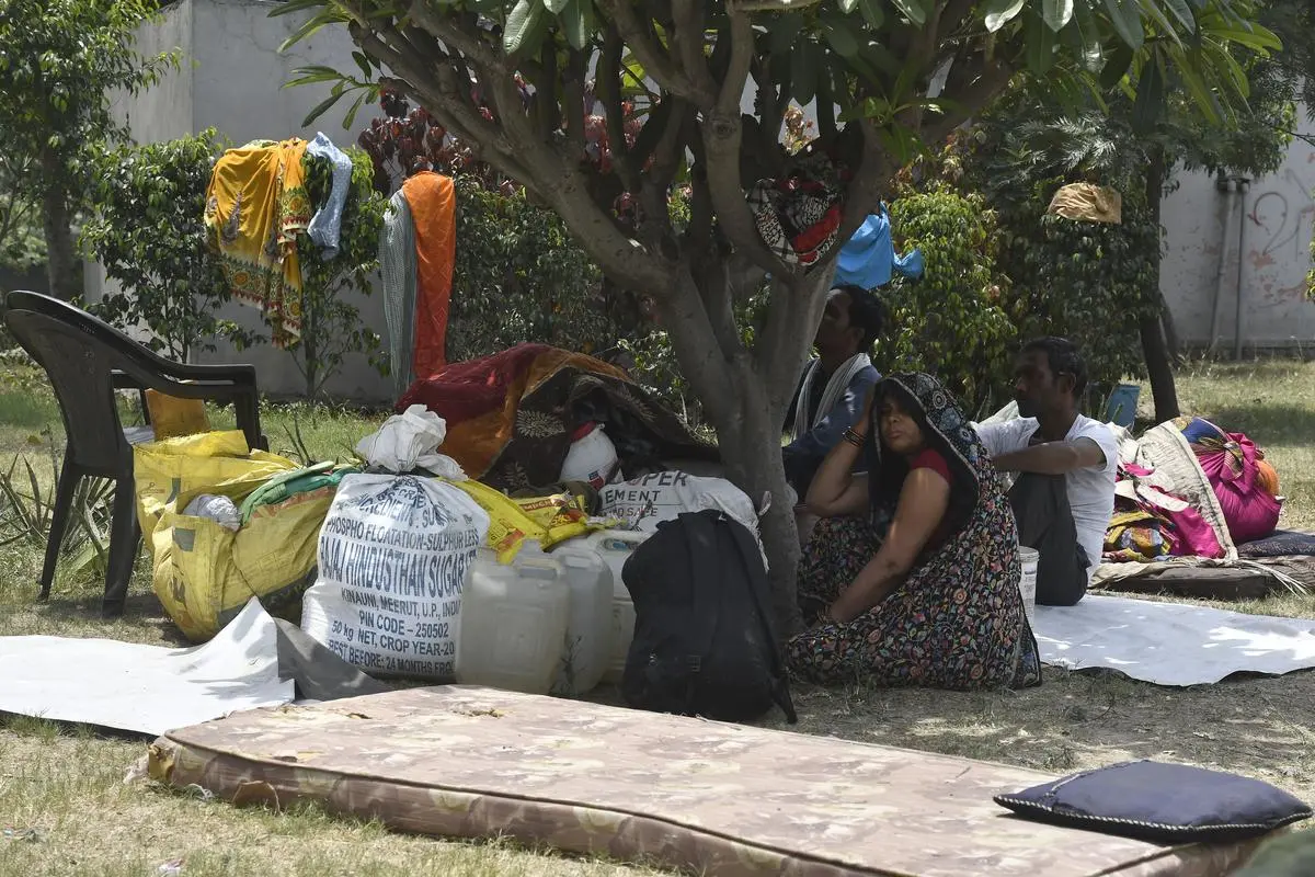 Hundreds of people were left homeless after the PWD demolished shanties at Dhaula Kuan in New Delhi on May 14, 2023. Hundreds of people were left homeless after the PWD demolished shanties at Dhaula Kuan in New Delhi on May 14, 2023.