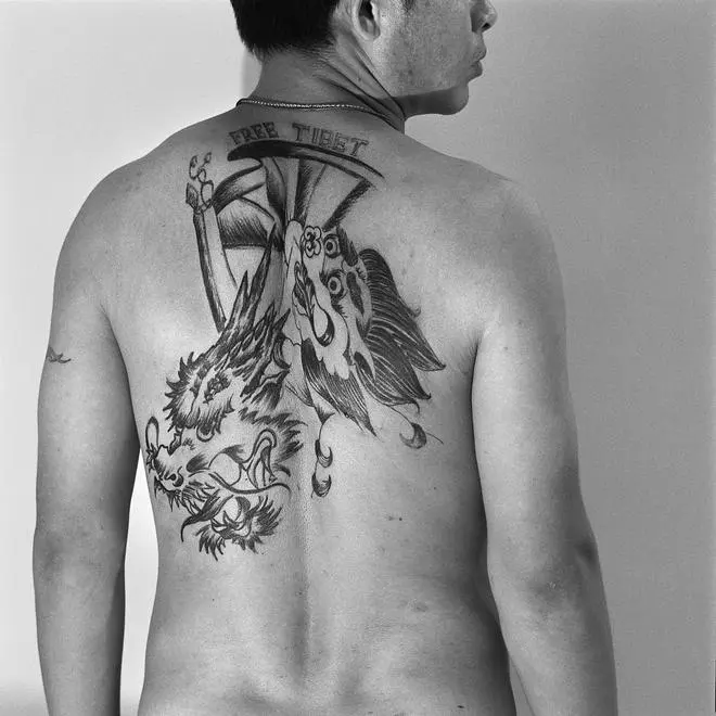 Wangdue Tsering of Majnu ka Tilla sports a tattoo reflecting the aspiration for a “free” Tibet. A 2009 photograph. Wangdue Tsering of Majnu ka Tilla sports a tattoo reflecting the aspiration for a “free” Tibet. A 2009 photograph.
