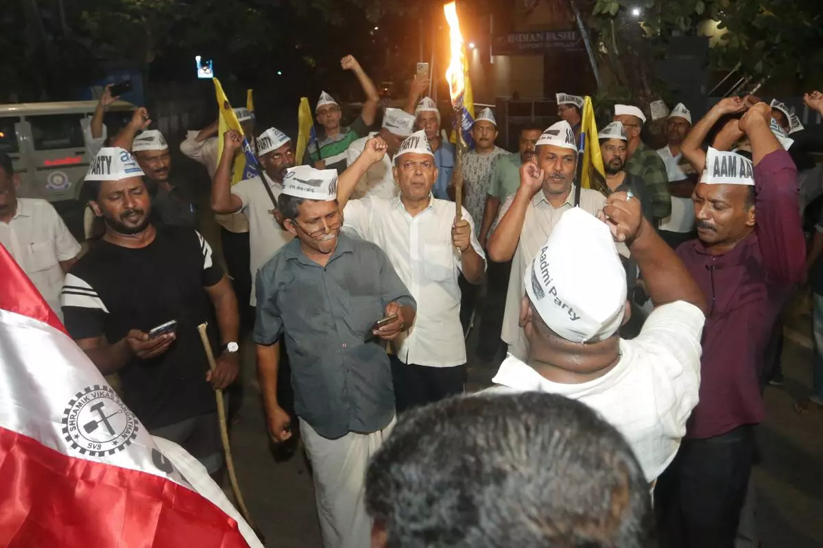 Aam Aadmi Party (AAP) workers taking out a march protesting against the arrest of party chief and Delhi Chief Minister Arvind Kejriwal in New Delhi on March 21.