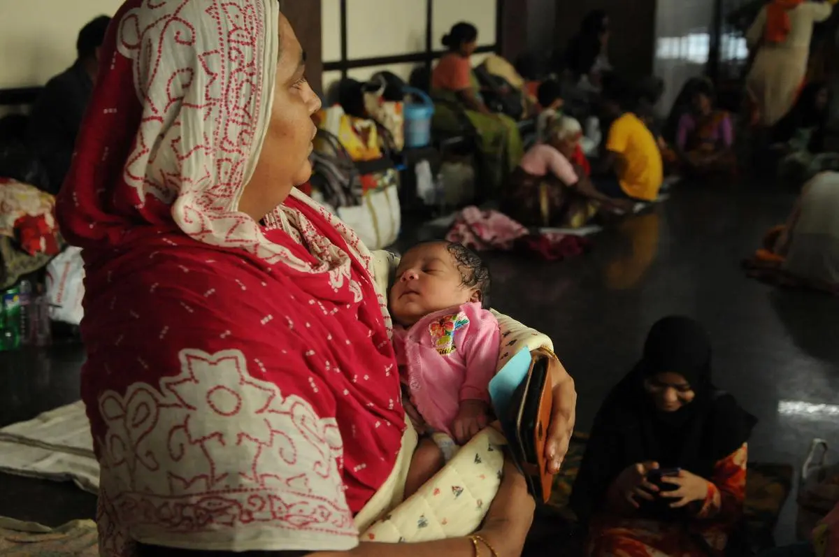 The PMJAY rate has become the benchmark for all patients, insured or otherwise. Here, a woman waits with her infant at Modern Government Maternity Hospital, in Petlaburj, Hyderabad, on August 5, 2022. The PMJAY rate has become the benchmark for all patients, insured or otherwise. Here, a woman waits with her infant at Modern Government Maternity Hospital, in Petlaburj, Hyderabad, on August 5, 2022.