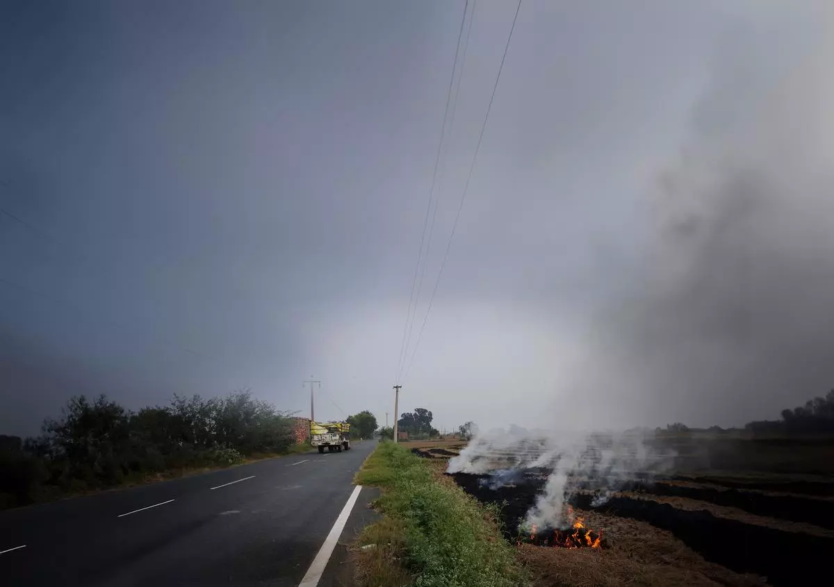 Stubble burning at Karnal in Haryana. The new CAQM Rules have fixed different slabs of fitness for stubble burning on the basis of the acreage. 