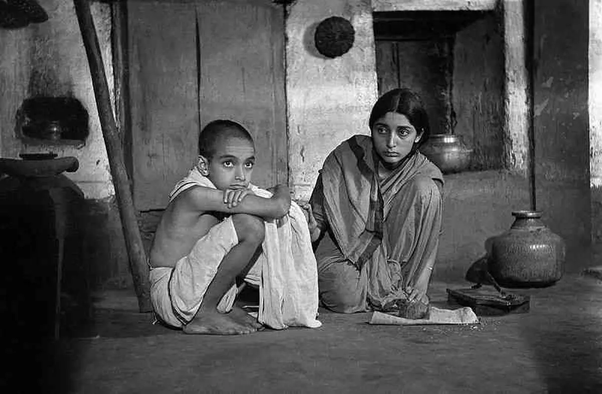 Kasaravalli reflects on how Apu’s world in Pather Panchali embodies Ray’s lyrical realism—where everyday struggles become moments of quiet transcendence. Kasaravalli reflects on how Apu’s world in Pather Panchali embodies Ray’s lyrical realism—where everyday struggles become moments of quiet transcendence.