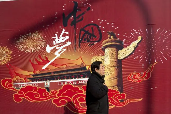 A man walks past the words “China Dream” on a street in Beijing in March 2015. President Xi Jinping calls the China Dream “the great rejuvenation of the Chinese nation” based on reviving the ruling party’s role as an economic, social and cultural leader in a throwback to what he sees as a golden age after the 1949 revolution. A man walks past the words “China Dream” on a street in Beijing in March 2015. President Xi Jinping calls the China Dream “the great rejuvenation of the Chinese nation” based on reviving the ruling party’s role as an economic, social and cultural leader in a throwback to what he sees as a golden age after the 1949 revolution.