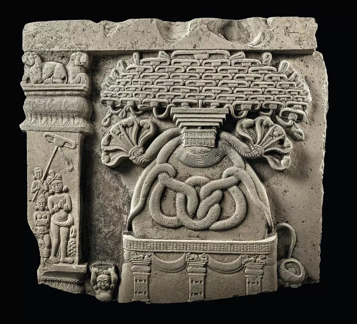 Limestone sculpture of Nagas protecting the Ramagrama stupa, Kanaganahalli, Karnataka, circa 1st century BCE. Kanaganahalli Site Museum, ASI.         