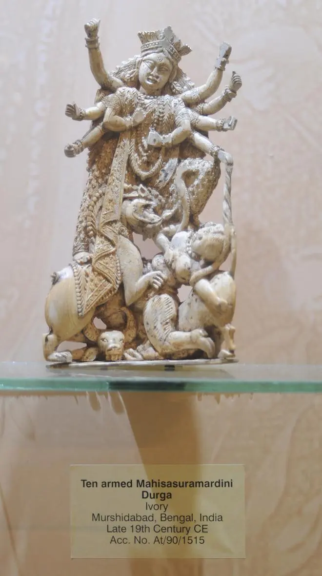 A 10-armed Mahishasuramardini ivory idol from Murshidabad, belong to the late 19th century CE. A 10-armed Mahishasuramardini ivory idol from Murshidabad, belong to the late 19th century CE.