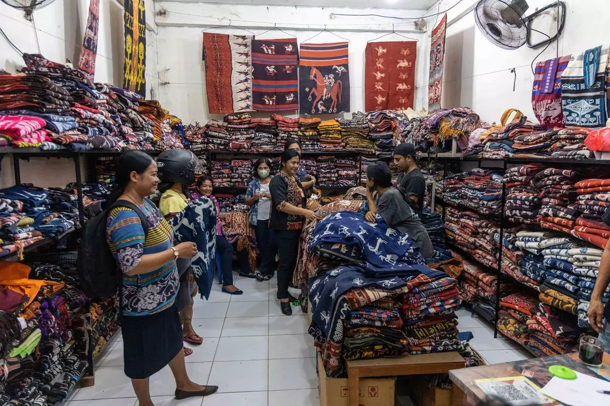 Sumbanese fabrics being sold in a market. The lengthy process of production makes it an expensive product. 