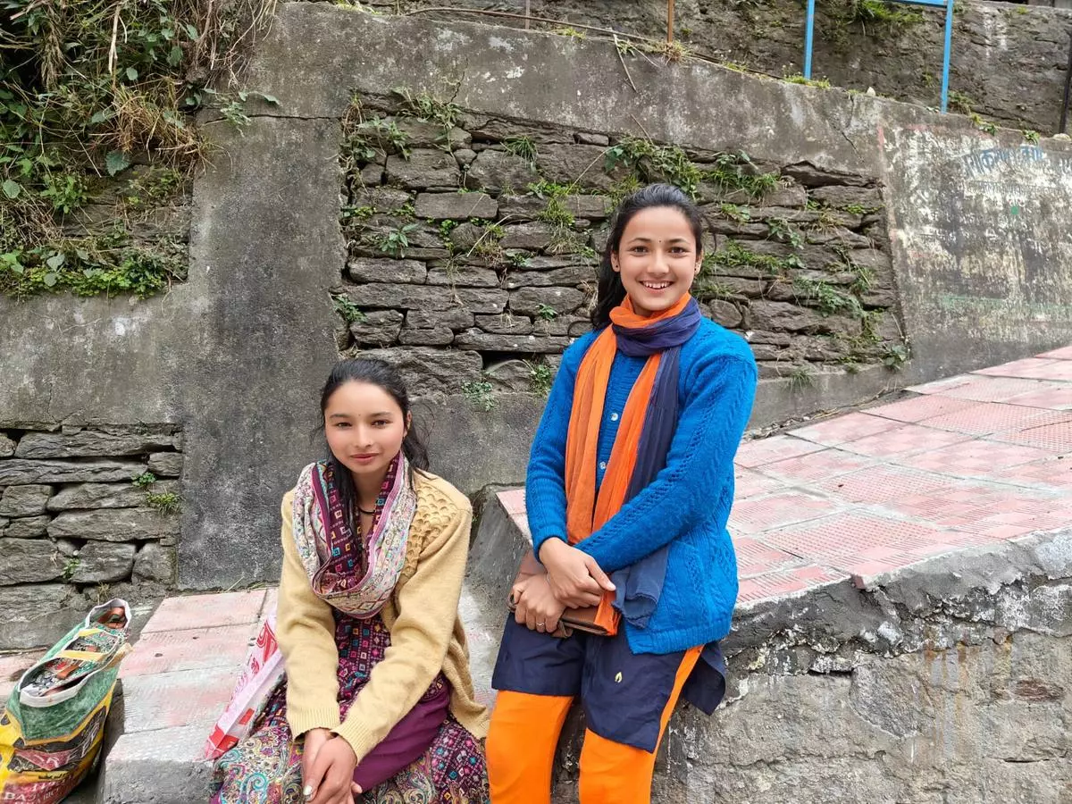 Young women of Raini like Mahima Rana (18), left, are among the first-time voters from the village.