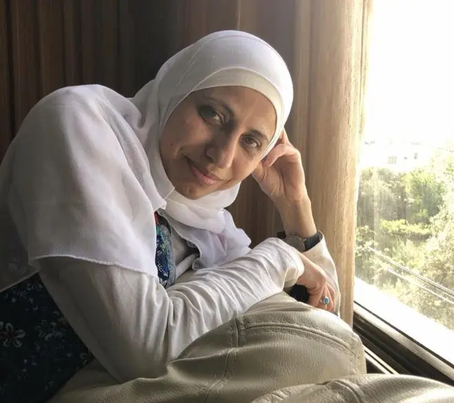 Denied a pen in prison, Palestinian poet Dareen Tatour used a zip ripped off her jacket to write. Denied a pen in prison, Palestinian poet Dareen Tatour used a zip ripped off her jacket to write.