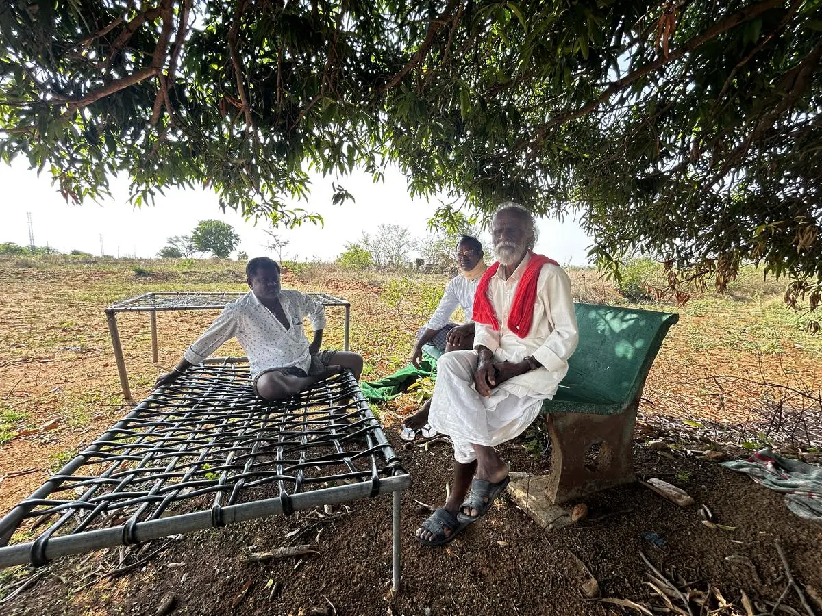 Narayana Das (wearing a red shawl) and others are concerned about being part of the Future City. They cannot imagine a future where they are no longer farmers.