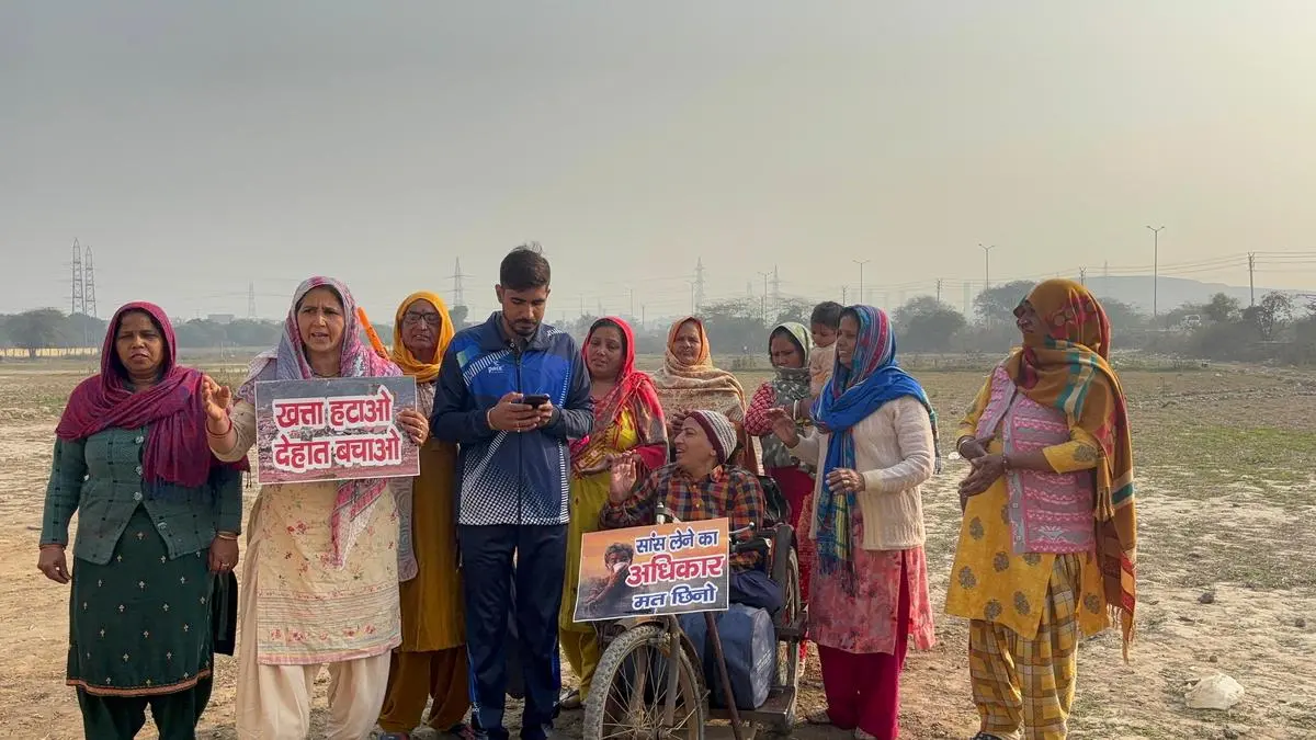 Rajkumari (second from left) and other women of Sanoth village gather daily at the protest site, singing self-composed songs as a form of resistance against the WTE plant. 