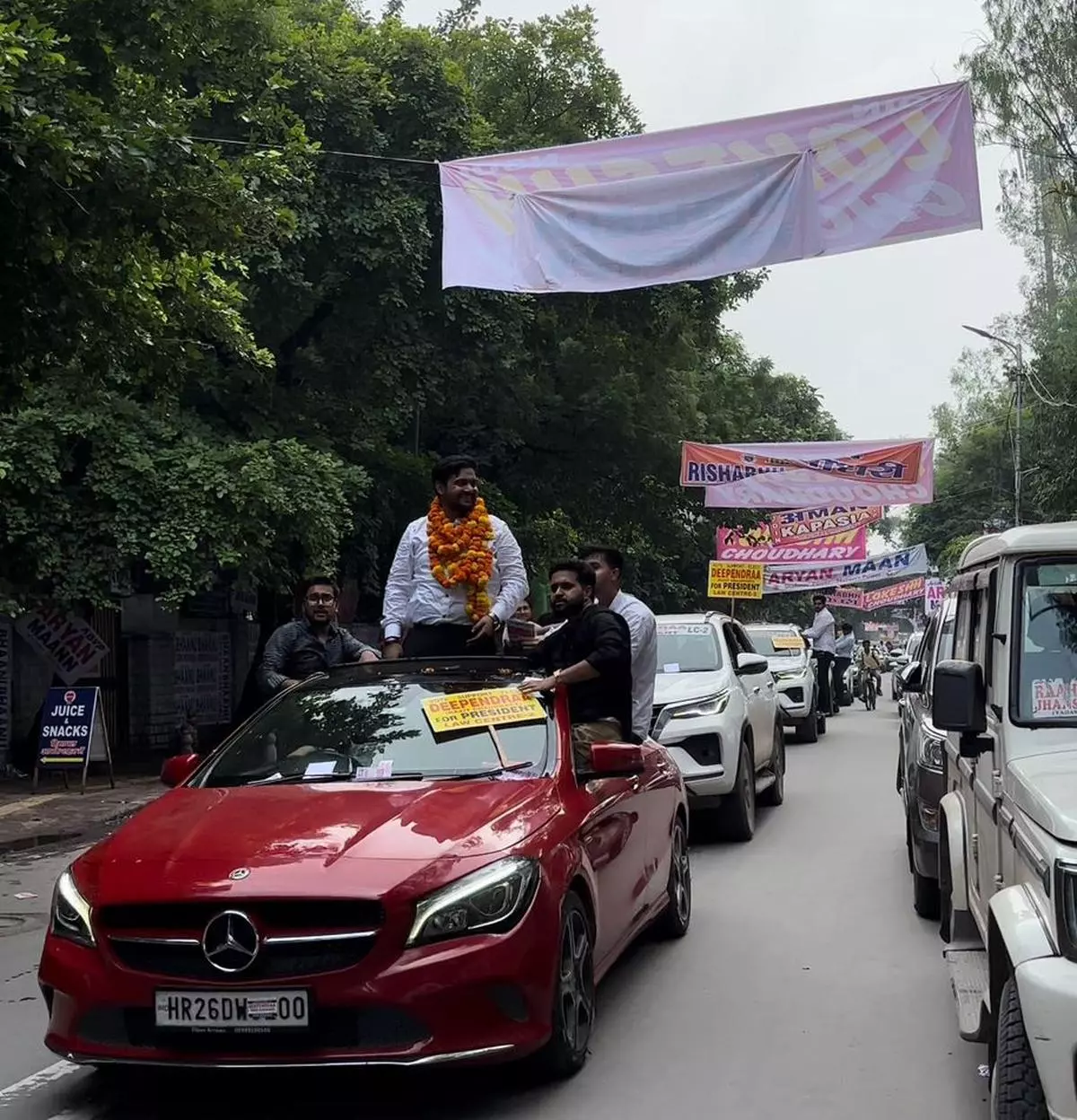 Cavalcades of luxury cars roam around the campus for canvassing. 