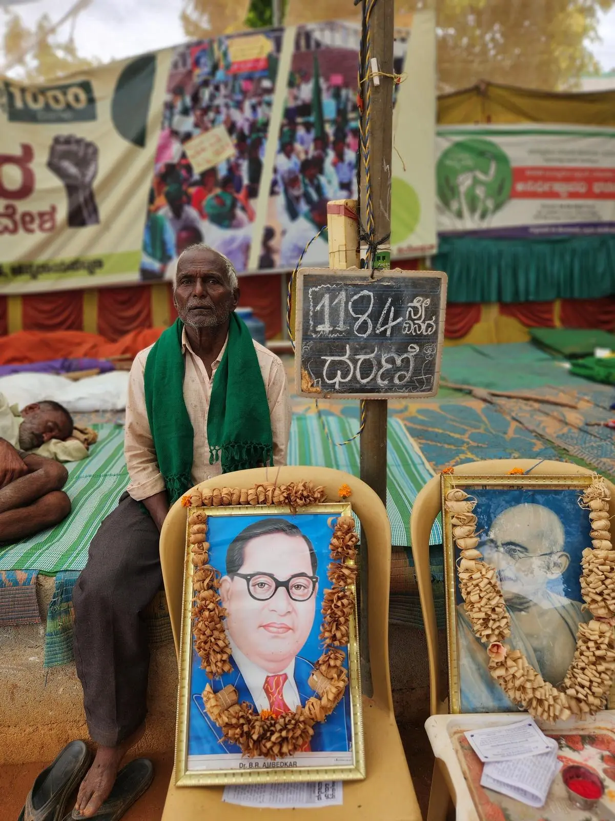 “Wiring” Pillappa at the protest site in Channarayapatna village. The indefinite protest commenced on April 4, 2022.