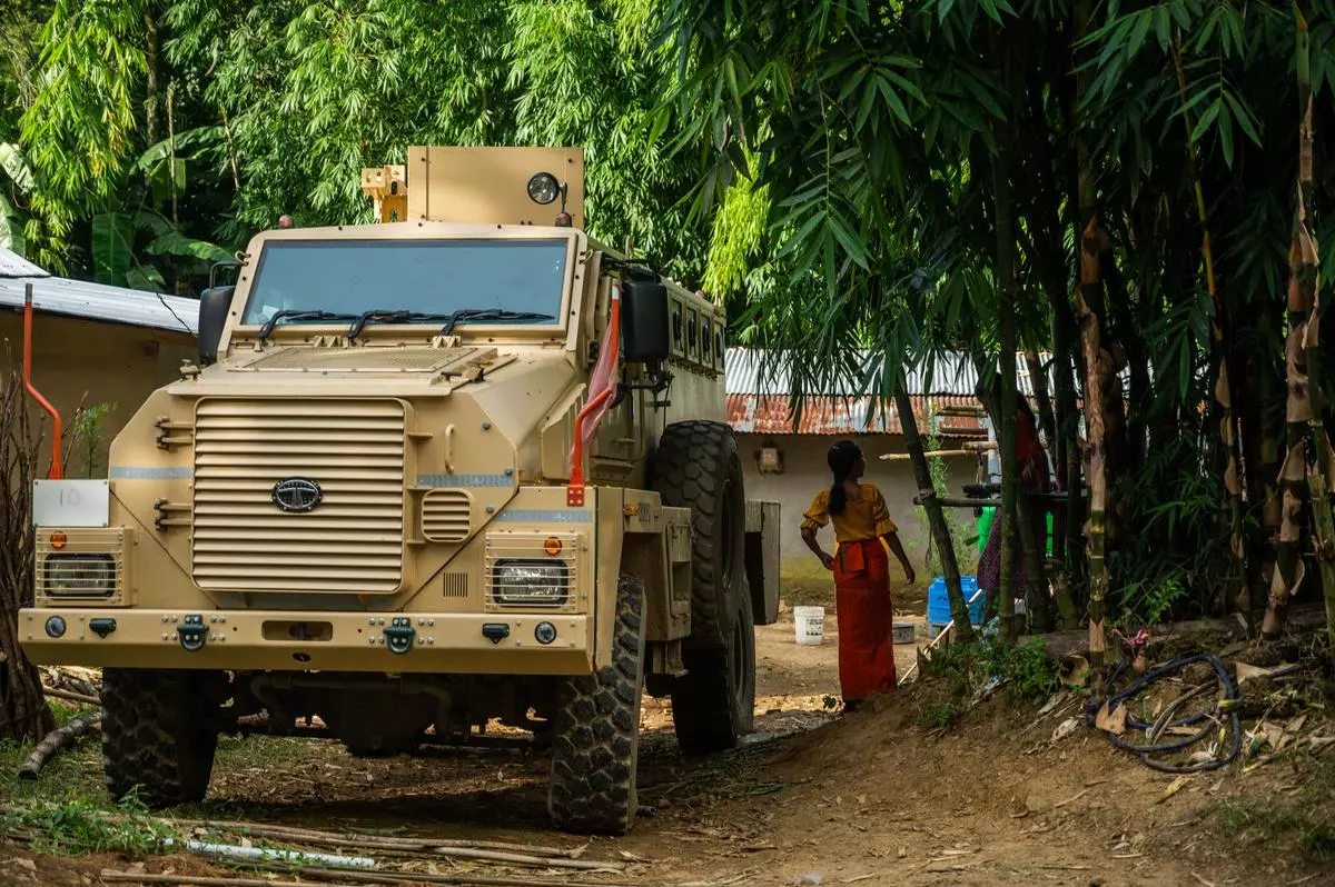 A bulletproof vehicle of security personnel is stationed in Koutruk. 