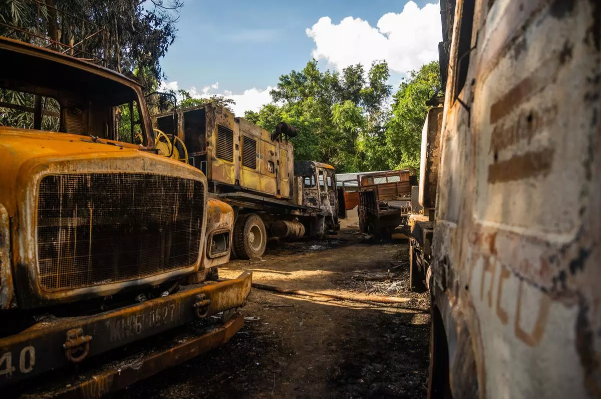 The drilling machinery brought in to create water sources was charred by the fire.  